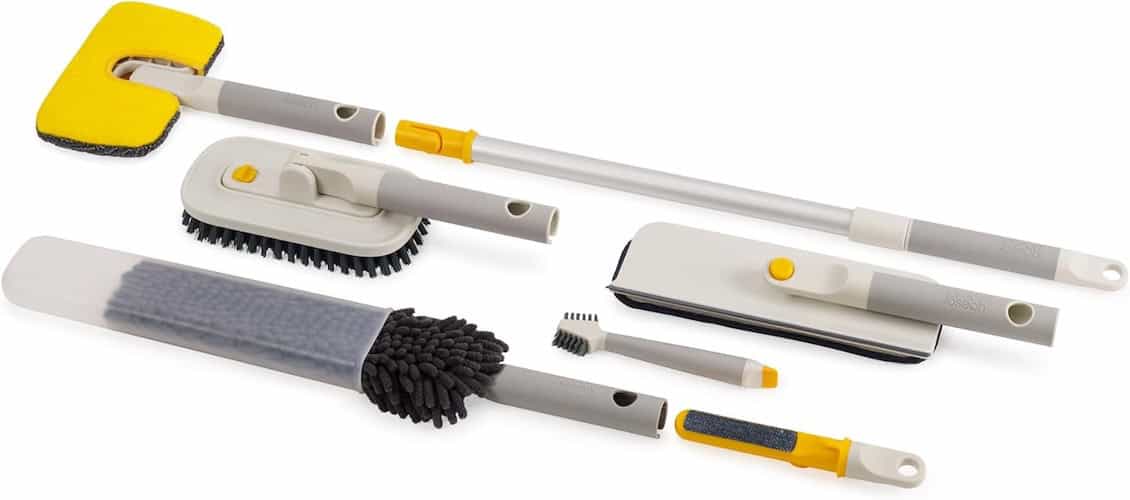 Multi-surface cleaning tools including mop, brush, and scrubber for home cleaning.