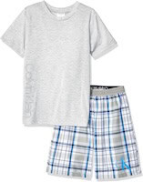 Boys travel outfit with T-shirt and plaid shorts for summer vacation.