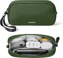 Travel kit with chargers and accessories for boys' summer vacation.