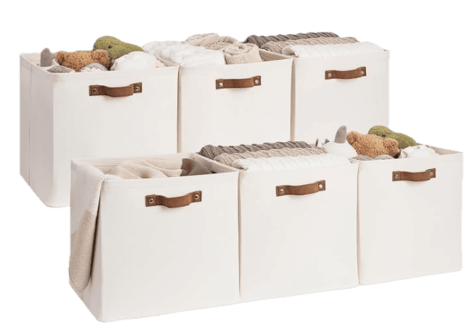 an image of a set of 3 ivory fabric Closet Baskets with brown faux leather handles in size 13x13x13