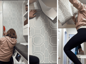A person applying peel-and-stick wallpaper on a kitchen wall with a geometric pattern.