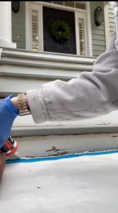 exterior stair repair caulking the area where wood steps meet concrete 
