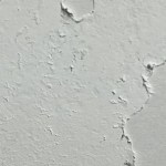 Example of spray paint peeling off in sections, likely due to poor adhesion or skipping primer.
