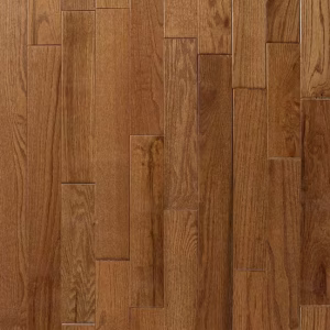 Close-up view of a wooden floor with polished, interlocking planks in a warm, brown tone.