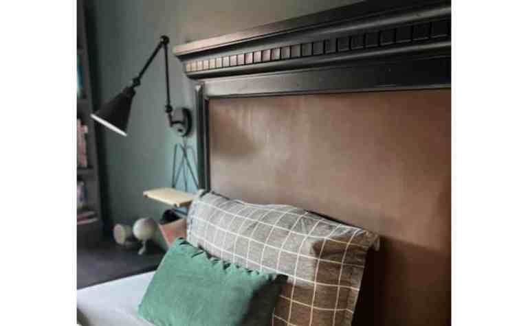 DIY faux leather headboard made from an old 90s dresser mirror, budget-friendly bedroom makeover.