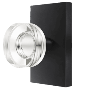 Round Emtek crystal interior door knob with a matte black backplate