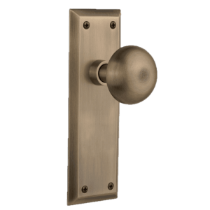 Vintage-style Nostalgic Warehouse interior door knob on a decorative plate.