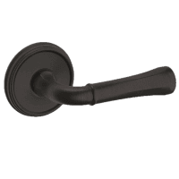 Classic Baldwin Estate interior door lever in a rich brass finish.