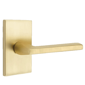 Emtek modern interior door lever in a satin brass finish.