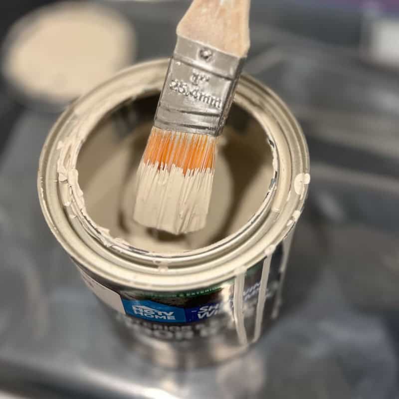 loading about the bottom third of the bristles to help making cleaning the paint brush easier