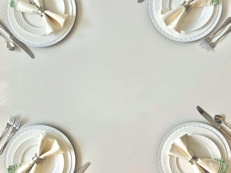 Dining table with grooves filled and smooth surface with place settings