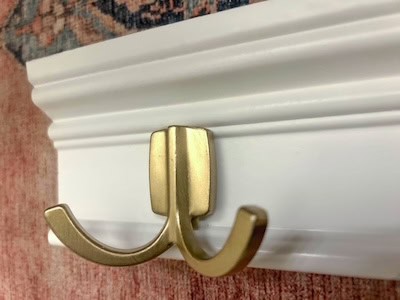 Modern gold double hook for bathroom towel storage