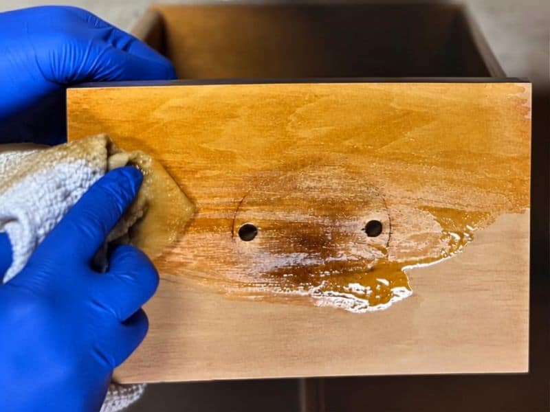 Applying wood conditioner before staining wood